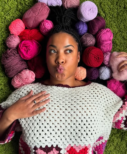 Image of Zakyla surrounded by yarn from instagram